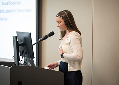 Student speaking at reunion weekend event