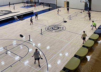 People playing pickleball