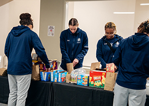 Women's basketball working at Royal Days of Service