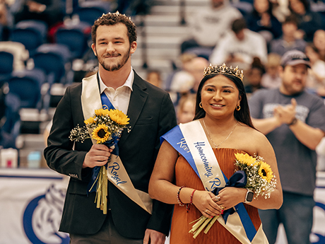 Homecoming king and queen during basketball game