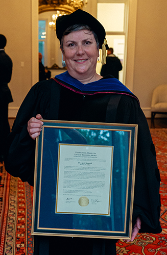 April Sipprell with award