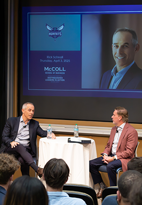 Rick Schnall speaking to Dr. Sparks on stage